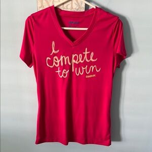 clearance price….NWOT Reebok sports top M